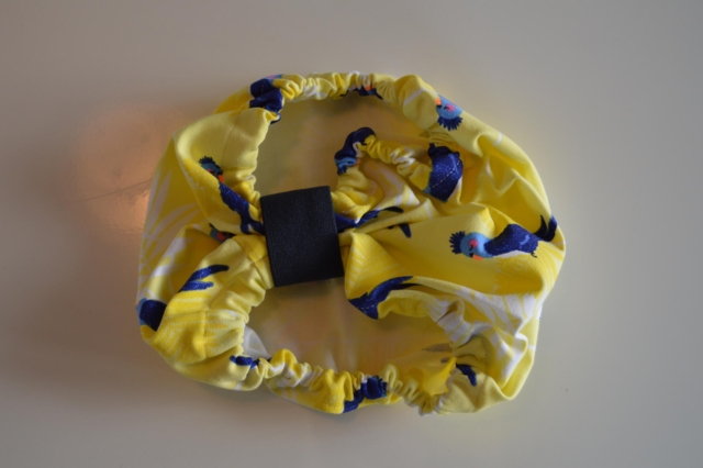 Snoods / Ørebeskytter ( Gul med fugl )