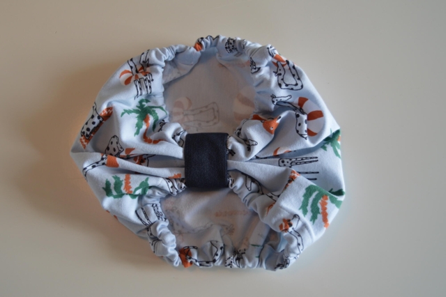 Snoods / Ørebeskytter ( Lyseblå med Giraf )