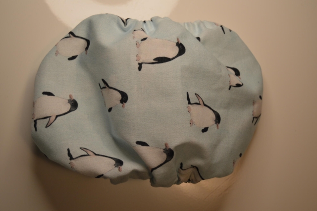 Snoods / Ørebeskytter / Pingvin / lyseblå )